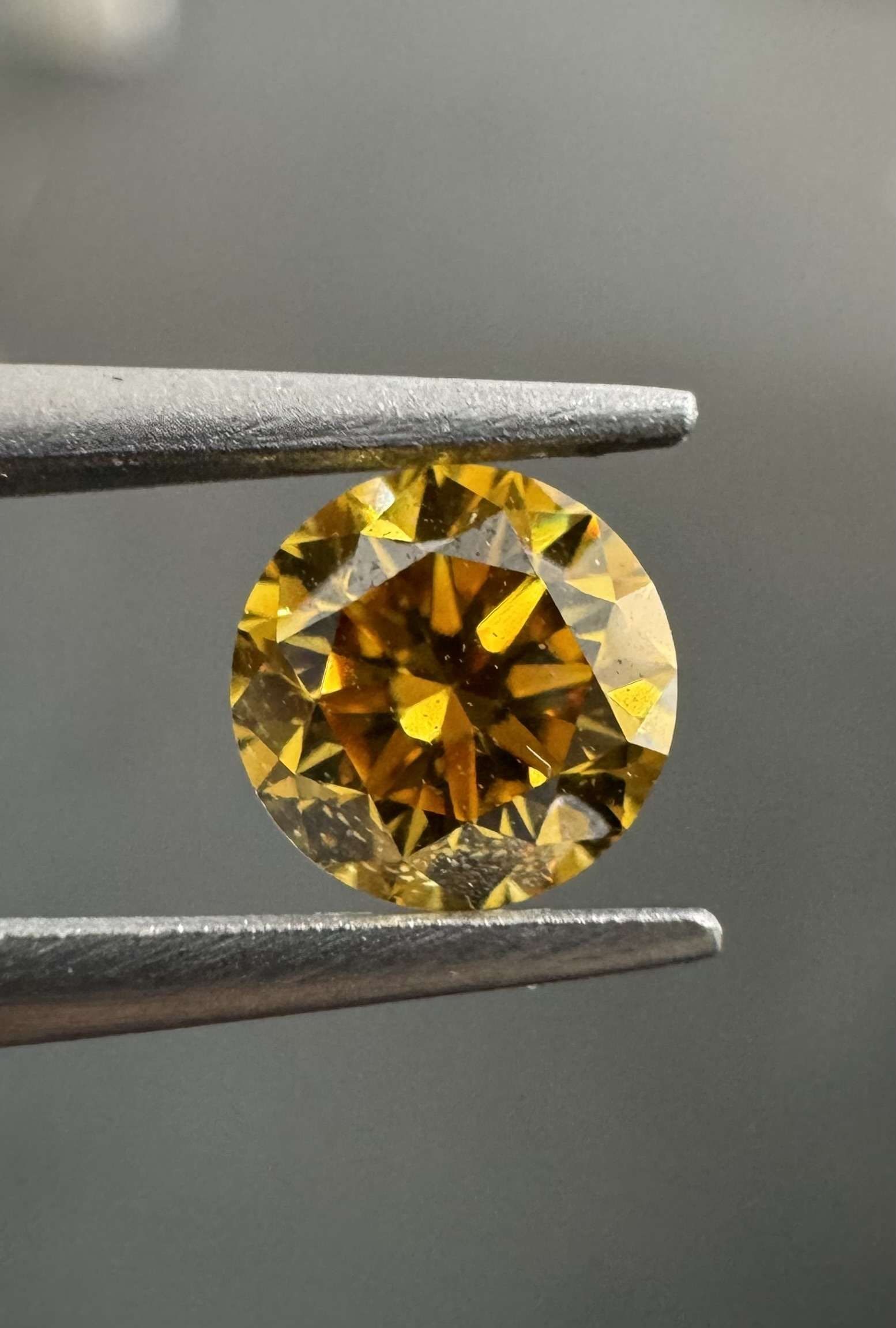 Loose Diamond - ROUND 0.52ct Fancy Deep Brownish Orangey Yellow SI1: Loose Diamond - ROUND 0.52ct Fancy Deep Brownish Orangey Yellow SI1 Source: Natural Shape: ROUND Carats: 0.52 Color: Fancy Deep Brownish Orangey Yellow Certification: GIA Video: