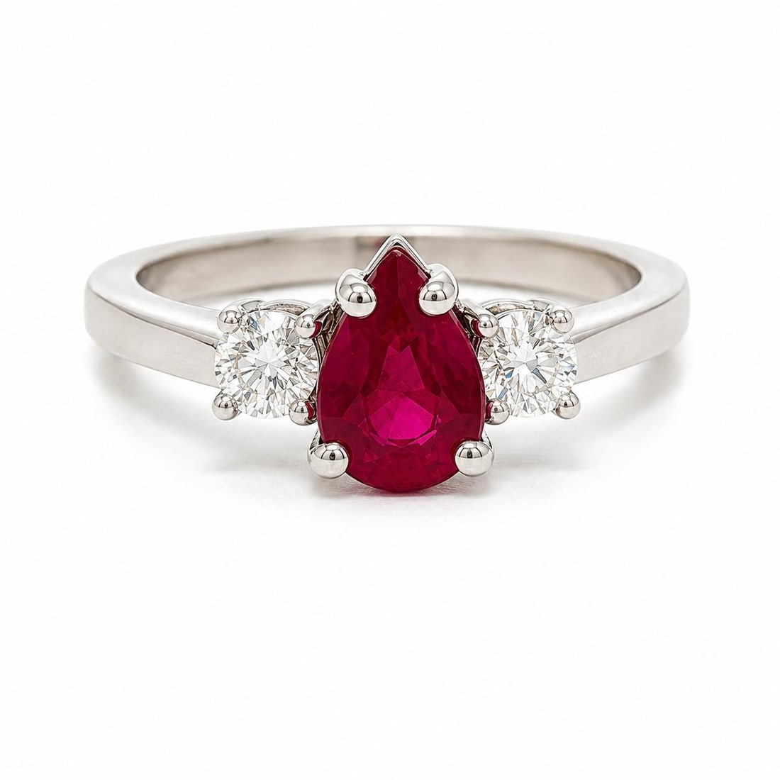 14k White Gold Cocktail Ring GIA Burma Ruby 1.36ctw with 2 Diamonds: 14k White Gold Cocktail Ring GIA Burma Ruby 1.36ctw with 2 Diamonds Cocktail ring crafted in solid 14k white gold, featuring a natural pear-cut vivid red Burma ruby accented by two round brilliant dia