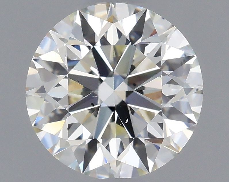 Loose Diamond - ROUND 1.0ct K VS2: Loose Diamond - ROUND 1.0ct K VS2 Source: Natural Shape: ROUND Carats: 1.0 Color: K Clarity: VS2 Certification: GIA Video: