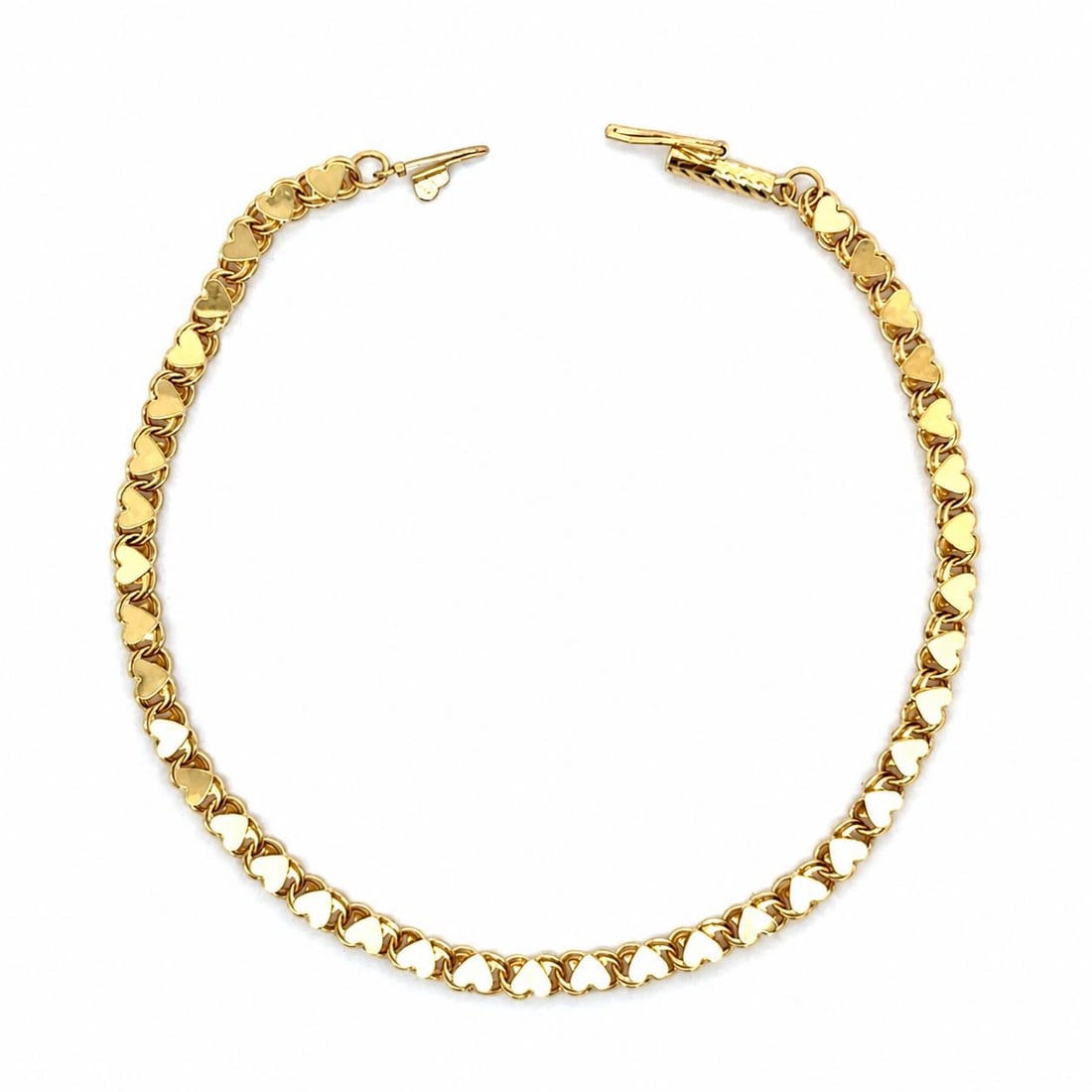Unbranded 14k Yellow Gold Heart Link Bracelet Barrel Push Clasp 7.25 in: Unbranded 14k Yellow Gold Heart Link Bracelet Barrel Push Clasp 7.25 in Pre-owned unbranded heart link chain bracelet crafted in solid 14k yellow gold. This women's bracelet features a barrel push cla