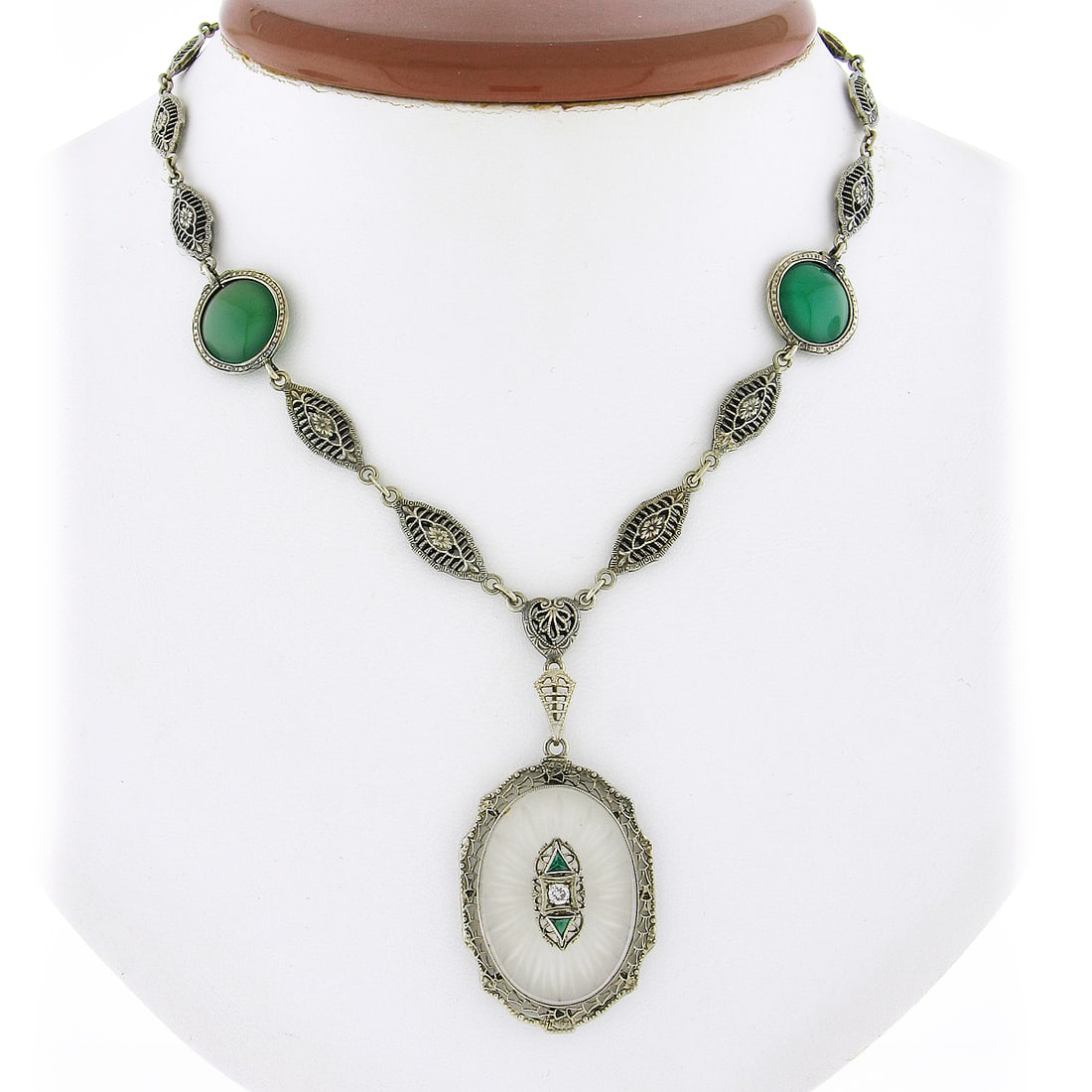 Art Deco camphor glass pendant necklace 12k 14k white gold chrysoprase: Art Deco camphor glass pendant necklace 12k 14k white gold chrysoprase This antique Art Deco drop necklace features an original oval camphor glass pendant set in intricate white gold filigree. The pen