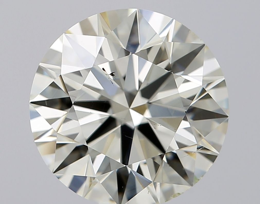Loose Diamond - ROUND 2.53ct K VS2: Loose Diamond - ROUND 2.53ct K VS2 Source: Natural Shape: ROUND Carats: 2.53 Color: K Clarity: VS2 Certification: IGI Video: