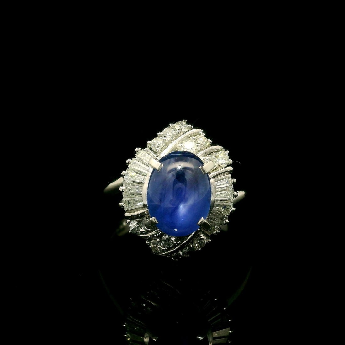 Platinum GIA Certified 2.53ct Blue Star Sapphire Diamond Halo Ring: Platinum GIA Certified 2.53ct Blue Star Sapphire Diamond Halo Ring Presenting a stunning cocktail ring featuring a natural blue star sapphire and a diamond halo. This exquisite piece showcases a 2.0ct