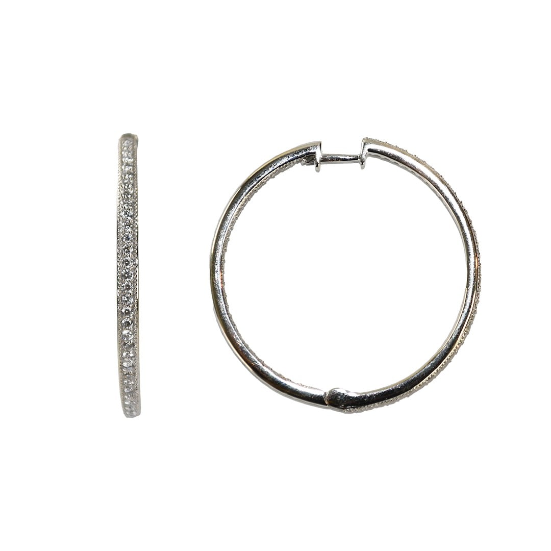 Unbranded 18K White Gold Hoop Earrings with 1.00ct Round Diamonds: Unbranded 18K White Gold Hoop Earrings with 1.00ct Round Diamonds Pre-owned ladies' hoop earrings crafted in 18k white gold and set with natural round brilliant diamonds. These pierced earrings have w