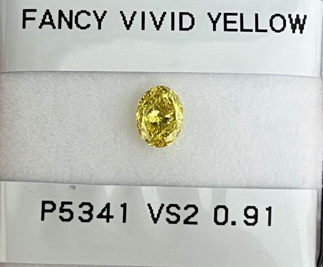 Loose Diamond - OVAL 0.91ct Fancy Vivid Yellow VS2: Loose Diamond - OVAL 0.91ct Fancy Vivid Yellow VS2 Source: Natural Shape: OVAL Carats: 0.91 Color: Fancy Vivid Yellow Certification: GIA Video: