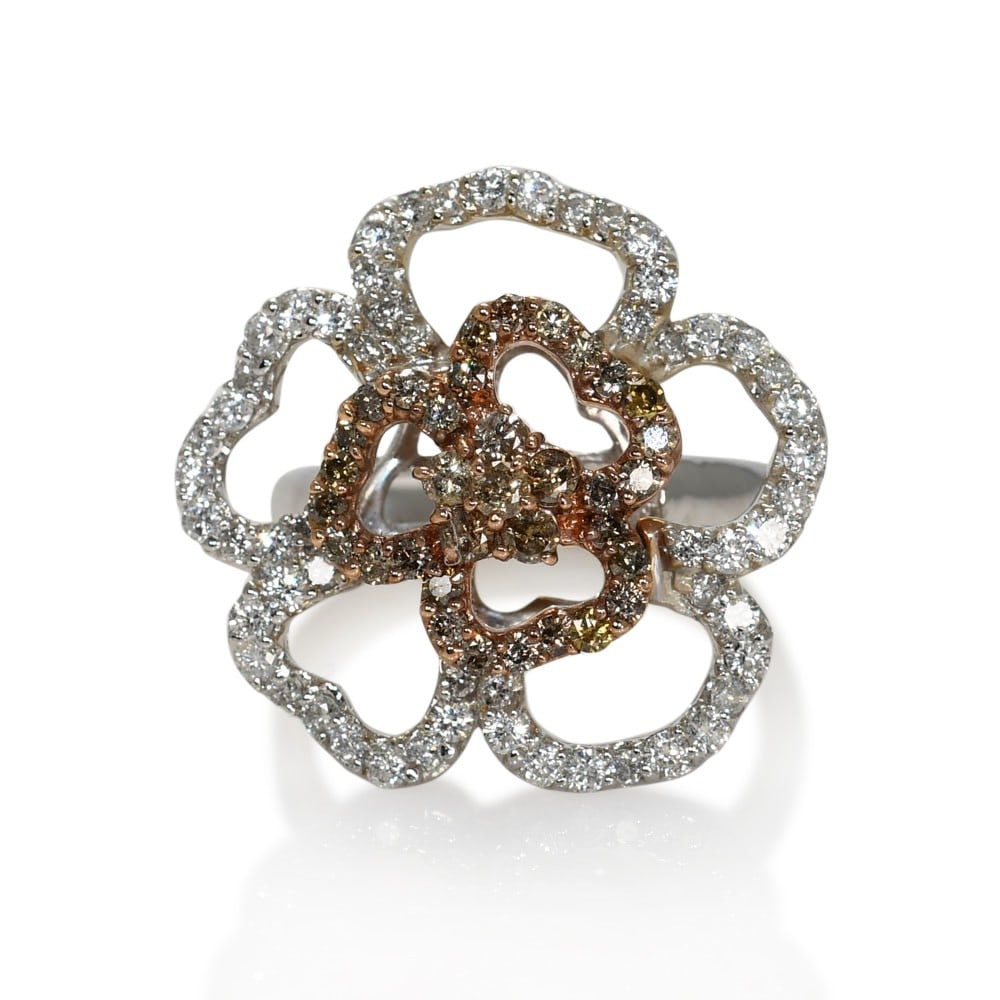 Floral Diamond Ring in 18K White Gold 2.00 CTW Size 10: Floral Diamond Ring in 18K White Gold 2.00 CTW Size 10 Pre-owned floral diamond ring crafted in 18k white gold with a flower-inspired design. It features natural round brilliant diamonds totaling 2.00