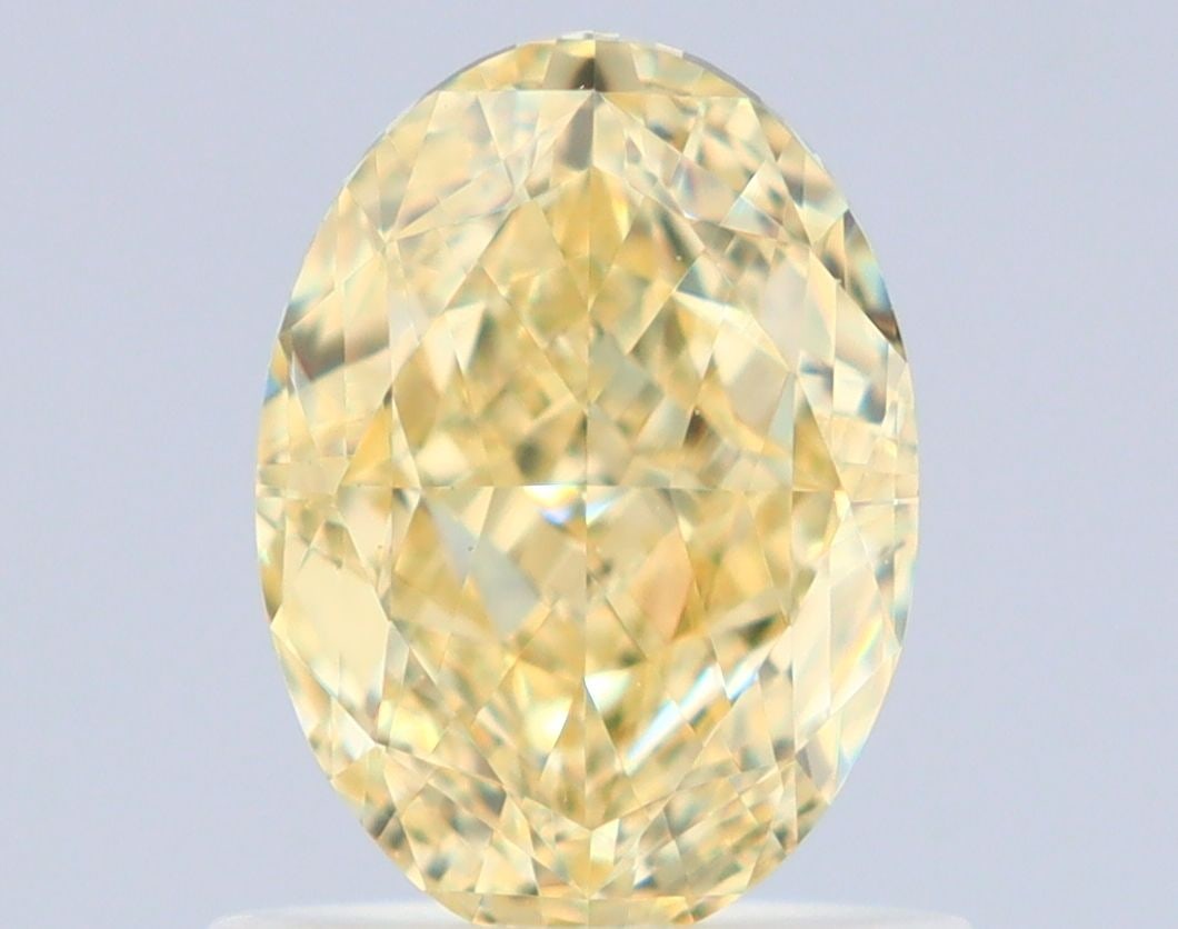 Loose Diamond - OVAL 1.05ct Fancy Yellow VS1: Loose Diamond - OVAL 1.05ct Fancy Yellow VS1 Source: Natural Shape: OVAL Carats: 1.05 Color: Fancy Yellow Certification: GIA Video: