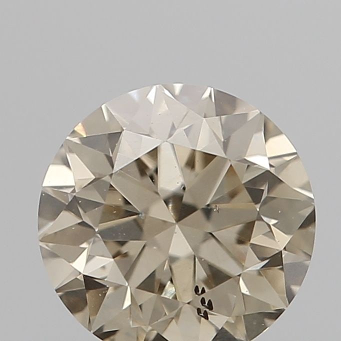 Loose Diamond - ROUND 0.4ct O-P I1: Loose Diamond - ROUND 0.4ct O-P I1 Source: Natural Shape: ROUND Carats: 0.4 Color: O-P Certification: NONE Video: