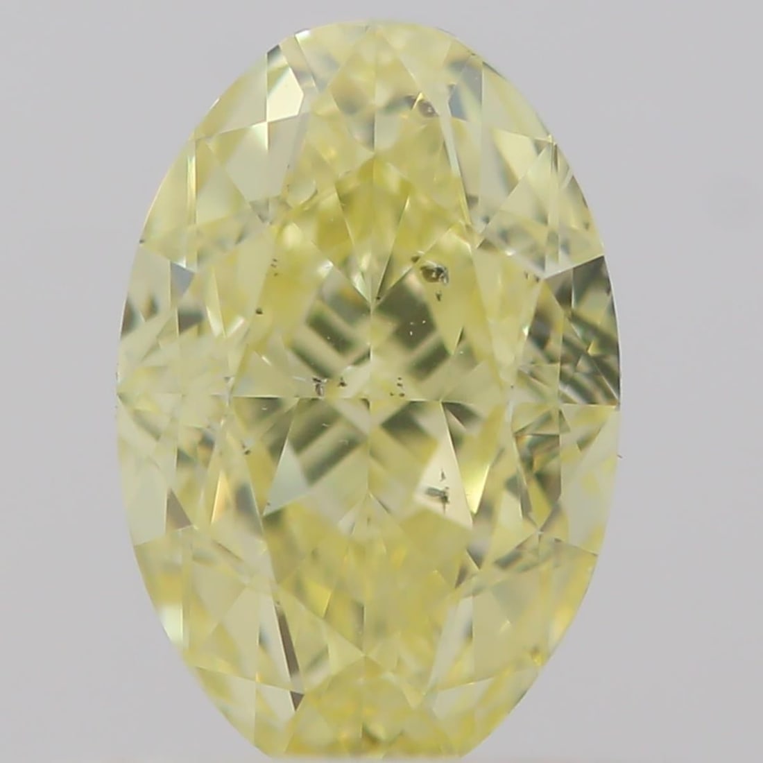 Loose Diamond - OVAL 0.59ct Fancy Yellow SI2: Loose Diamond - OVAL 0.59ct Fancy Yellow SI2 Source: Natural Shape: OVAL Carats: 0.59 Color: Fancy Yellow Certification: GIA Video: