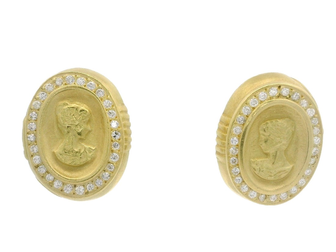 18k Yellow Gold Cameo Lady Earrings with 0.84ct Diamond Halo: 18k Yellow Gold Cameo Lady Earrings with 0.84ct Diamond Halo These stunning large earrings feature a captivating cameo portrait of a lady, elegantly framed by a halo of natural diamonds. Crafted from 