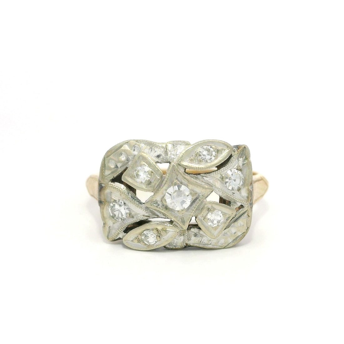 Antique Art Deco 0.15ct Diamond Ribbon Band Ring in Yellow Gold: Antique Art Deco 0.15ct Diamond Ribbon Band Ring in Yellow Gold This exquisite Antique Art Deco Cushion-Shaped Dinner Band Ring features a beautifully crafted ribbon design with intricate milgrain etc