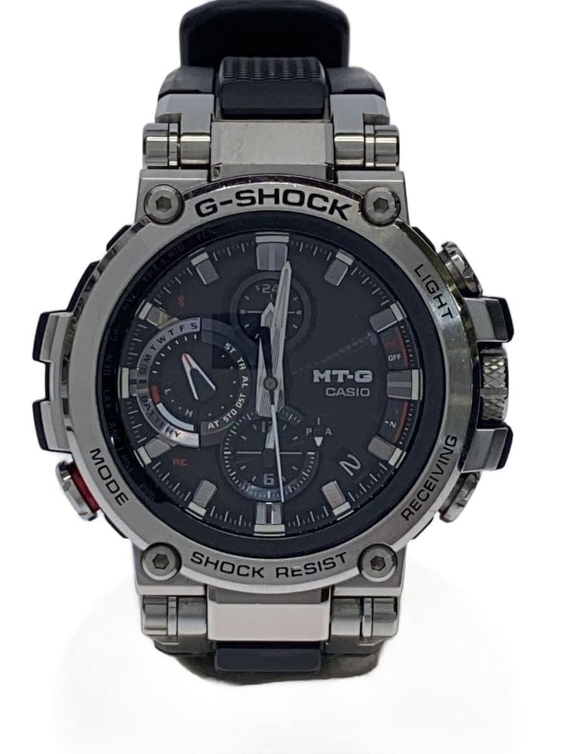 Casio G Shock MTG B1000 1AJF Silver Men's Wristwatch: Casio G Shock MTG B1000 1AJF Silver Men's Wristwatch This is a Casio G-SHOCK MTG-B1000-1AJF men's wristwatch in a slightly used condition. The watch features a silver tone, with a robust case and band