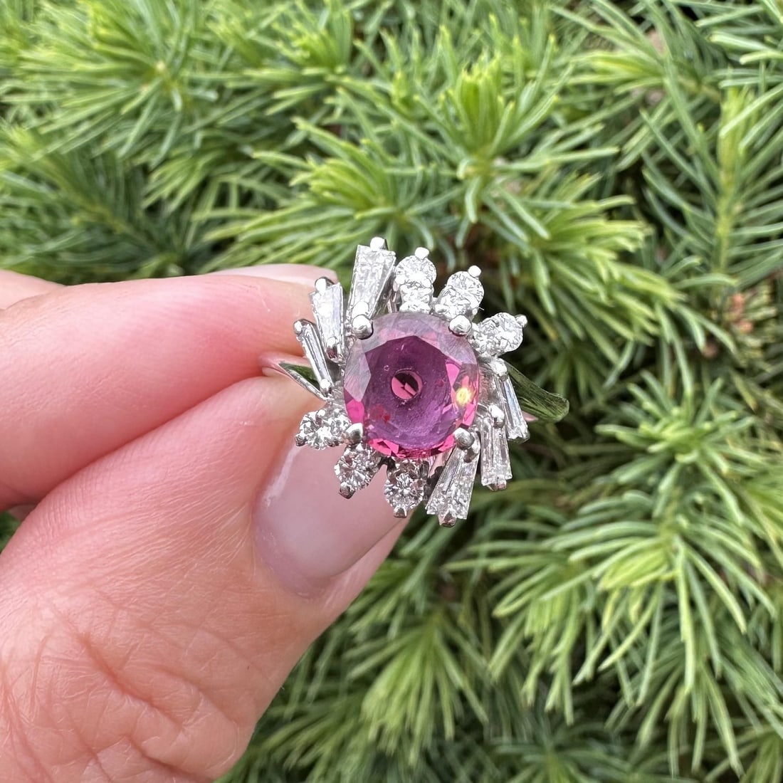 Vintage platinum cocktail ring with GIA pink sapphire and diamond spray: Vintage platinum cocktail ring with GIA pink sapphire and diamond spray Vintage cocktail ring crafted in solid platinum and centered with a natural deep pink oval sapphire. The sapphire is described a