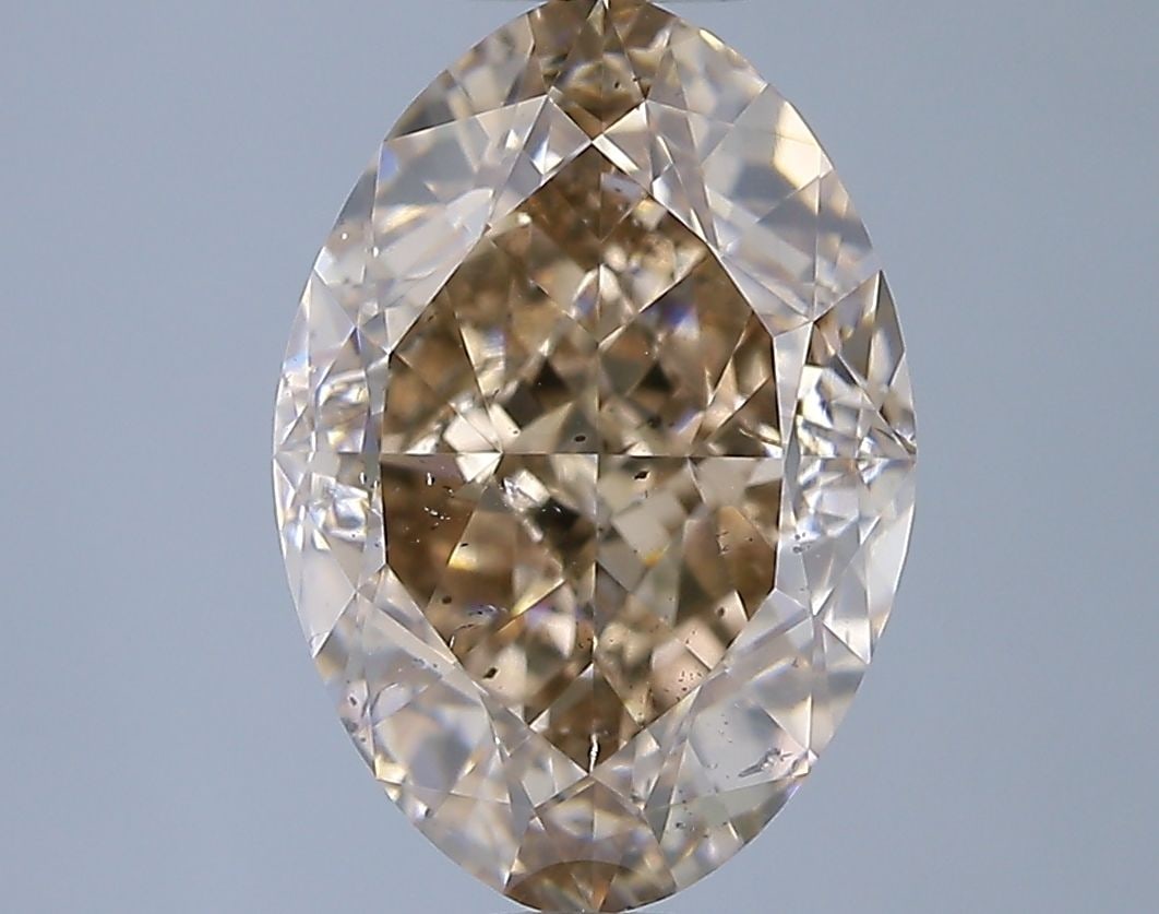 Loose Diamond - OVAL 3.0ct Orange Brown SI1: Loose Diamond - OVAL 3.0ct Orange Brown SI1 Source: Natural Shape: OVAL Carats: 3.0 Color: Orange Brown Certification: NONE Video: