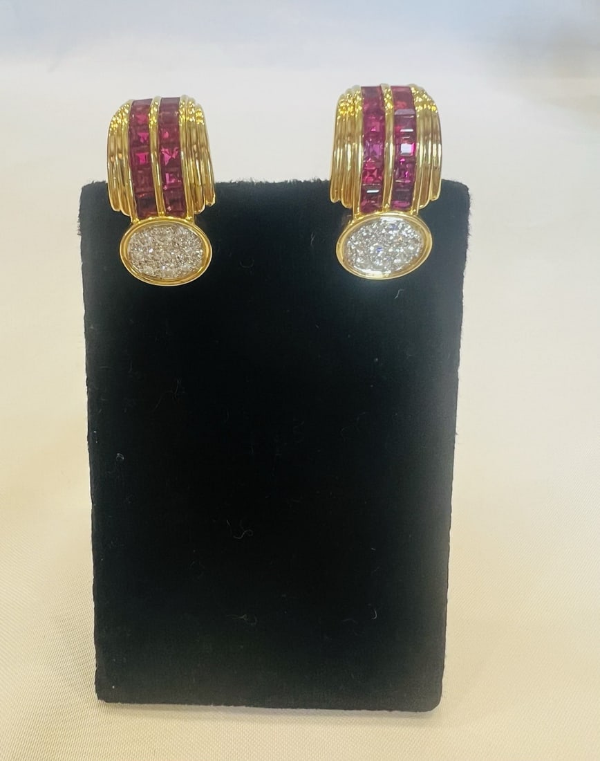 French Ruby Diamond Cuff Earrings in 18K Gold and Platinum: French Ruby Diamond Cuff Earrings in 18K Gold and Platinum Magnificent French cuff-style earrings crafted in 18k gold and platinum, featuring rubies and diamonds in a detailed design with fine workman