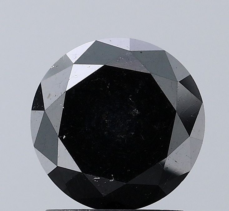 Loose Diamond - ROUND 1.84ct Fancy Black VS2: Loose Diamond - ROUND 1.84ct Fancy Black VS2 Source: Natural Shape: ROUND Carats: 1.84 Color: Fancy Black Certification: NONE Video: