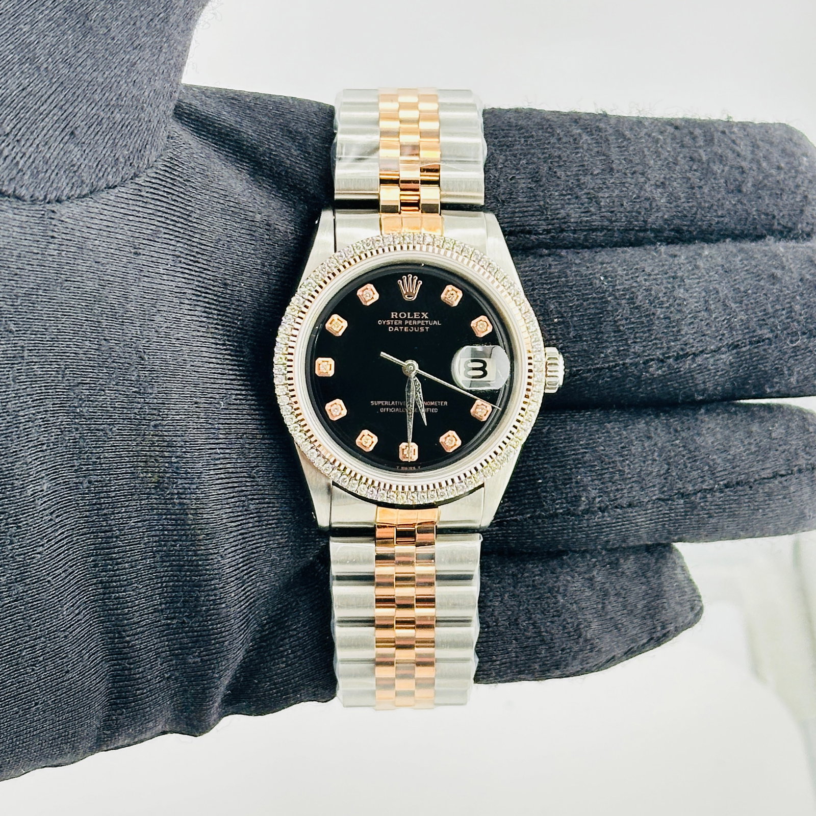 Rolex Datejust 1601 Mens Watch aftermarket black diamond dial: Rolex Datejust 1601 Mens Watch aftermarket black diamond dial Rolex Datejust reference 1601 wristwatch featuring an Aftermarket black diamond dial, a prong RG plated diamond bezel, and an Aftermarket 