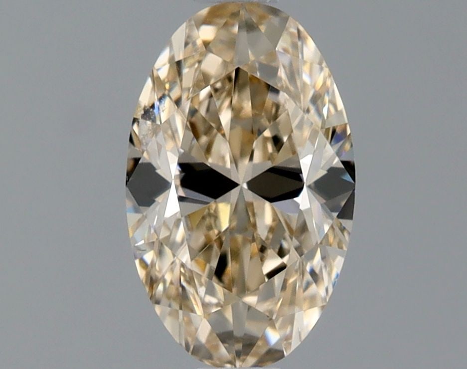 Loose Diamond - OVAL 0.9ct Fancy Light Orangey Yellow VS2: Loose Diamond - OVAL 0.9ct Fancy Light Orangey Yellow VS2 Source: Natural Shape: OVAL Carats: 0.9 Color: Fancy Light Orangey Yellow Certification: GIA Video: