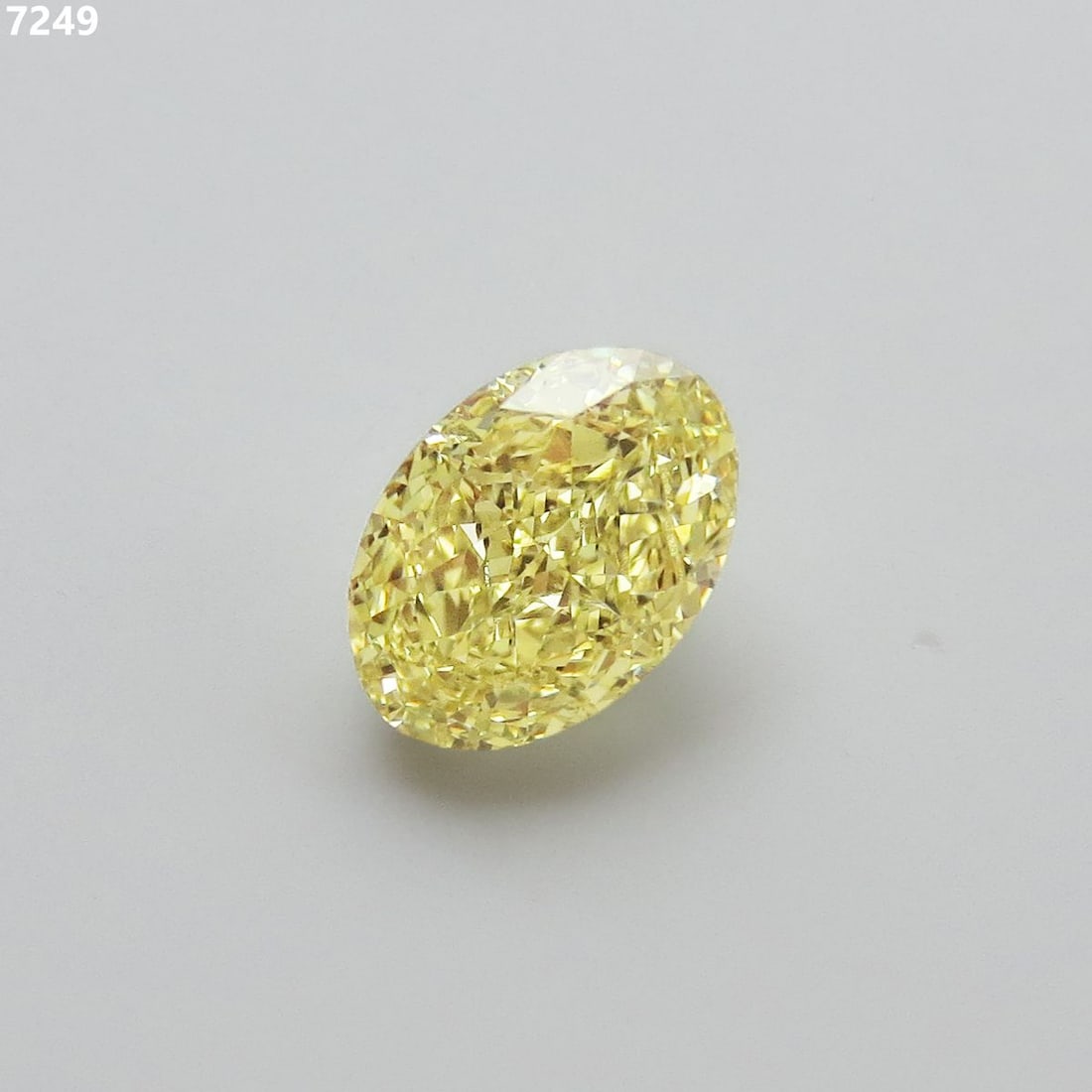 Loose Diamond - OVAL 2.01ct Fancy Yellow VS2: Loose Diamond - OVAL 2.01ct Fancy Yellow VS2 Source: Natural Shape: OVAL Carats: 2.01 Color: Fancy Yellow Certification: GIA The Diamond Depot Guarantee: All items in this auction are guaranteed to be