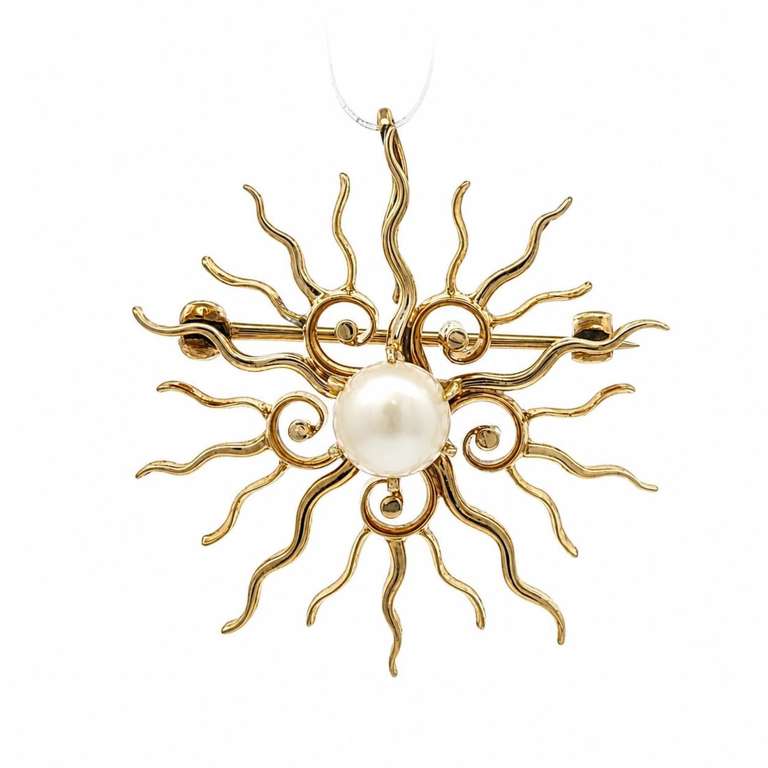 Unbranded 14k Yellow Gold Pearl Sunburst Pin Pendant Brooch: Unbranded 14k Yellow Gold Pearl Sunburst Pin Pendant Brooch Antique brooch pendant crafted in solid yellow gold with a sunrays burst spray design centered by a button pearl. This pre-owned piece has a