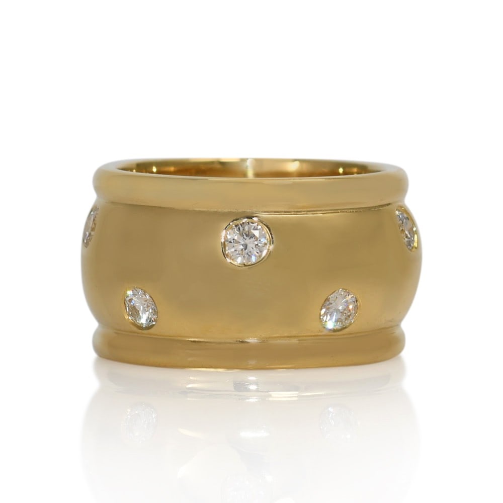 Diamond Band Ring 14K Yellow Gold 13mm 12g Size 8.5: Diamond Band Ring 14K Yellow Gold 13mm 12g Size 8.5 Large 14k yellow gold diamond band ring with a wide profile and classic round brilliant diamonds. This pre-owned ring features 10 natural diamonds a