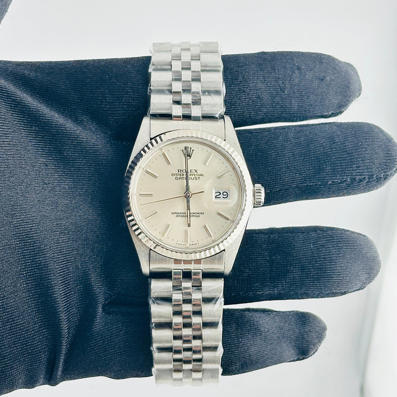 Rolex Datejust 16014 Silver Stick Dial Fluted Bezel aftermarket Jubilee Bracelet: Rolex Datejust 16014 Silver Stick Dial Fluted Bezel aftermarket Jubilee Bracelet This Rolex Datejust features a silver stick dial, a fluted bezel, and is fitted with an aftermarket Jubilee bracelet. T
