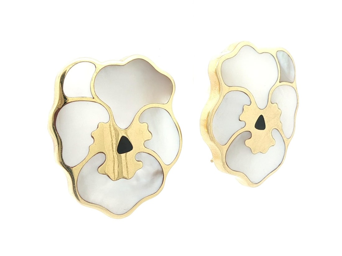 Tiffany & Co. 18k Gold Mother of Pearl Pansy Flower Clip On Earrings: Tiffany & Co. 18k Gold Mother of Pearl Pansy Flower Clip On Earrings These exquisite Vintage Tiffany & Co. clip-on earrings showcase a stunning pansy flower design crafted from solid 18k yellow gold. 