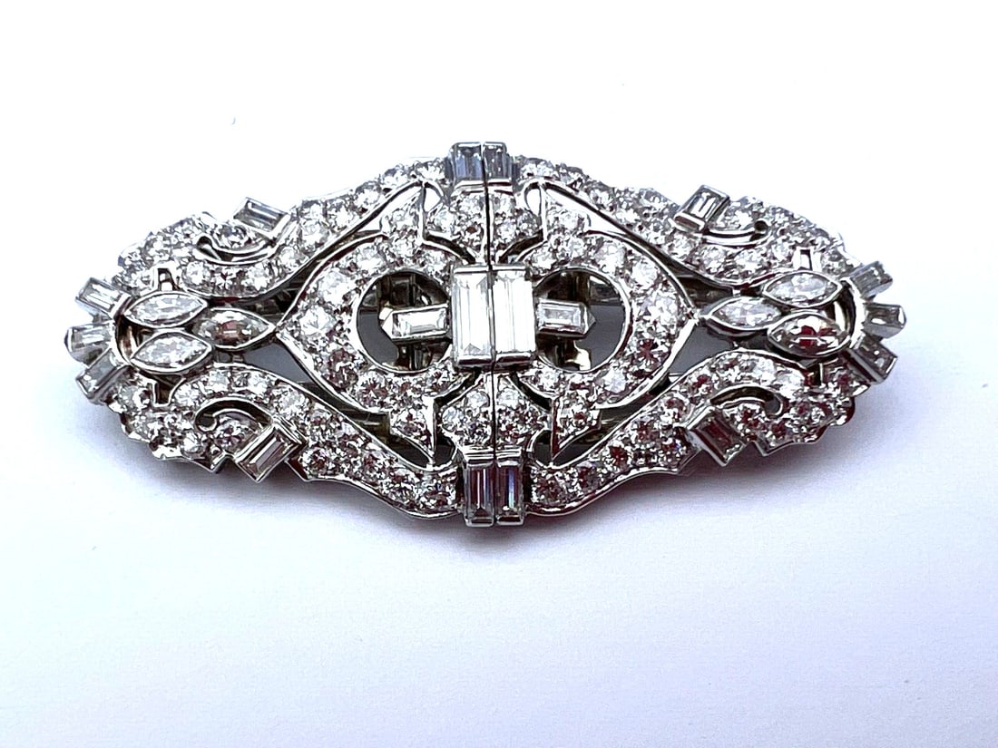 French Art Deco Platinum Diamond Double Clip Brooch 4ct: French Art Deco Platinum Diamond Double Clip Brooch 4ct This exquisite original French Art Deco brooch showcases a stunning design crafted in platinum and adorned with diamonds. Featuring baguette, ma