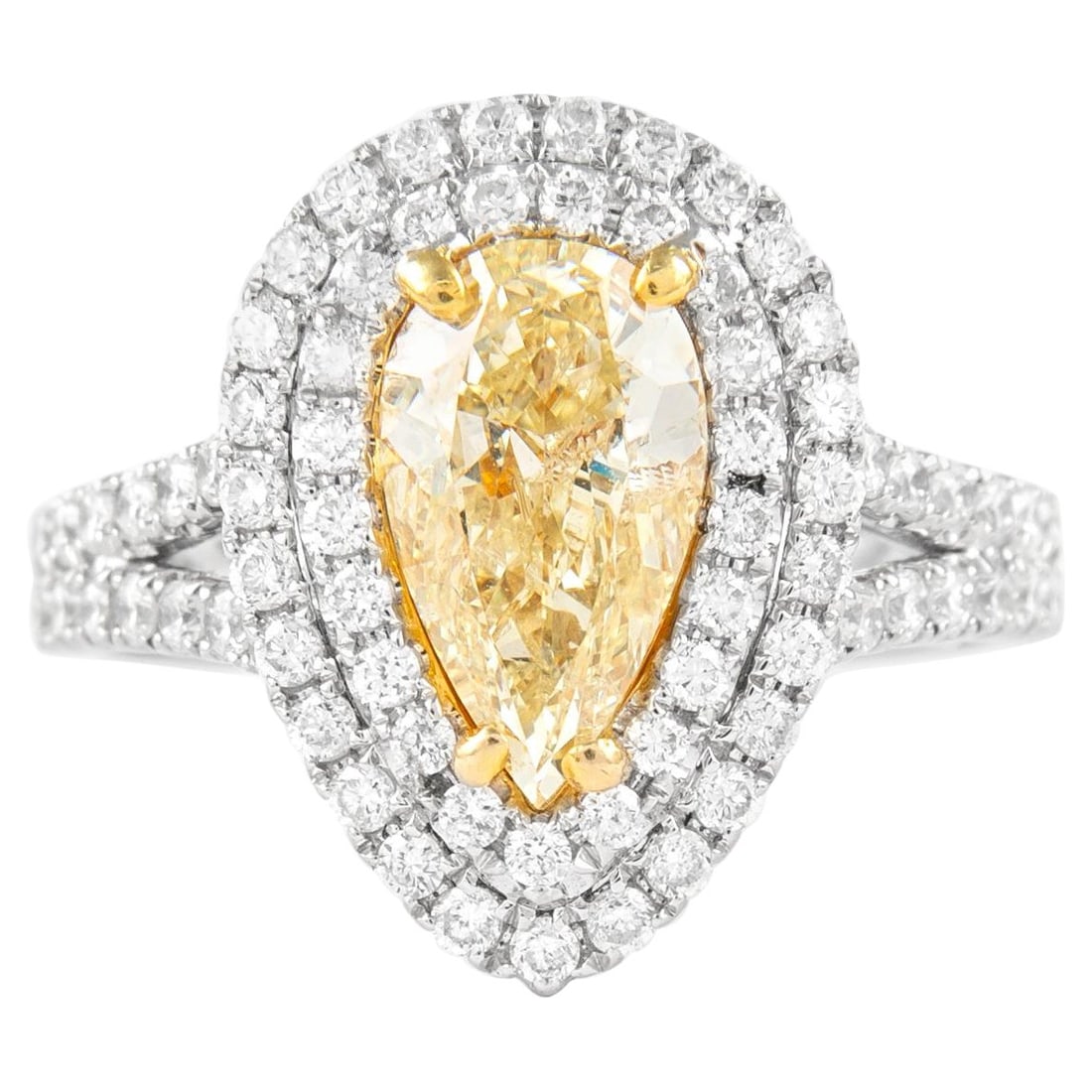 2.04ct Fancy Yellow Diamond Double Halo Ring 18k Gold EGL Certified: 2.04ct Fancy Yellow Diamond Double Halo Ring 18k Gold EGL Certified This exquisite 2.04ct Fancy Yellow Pear Diamond Double Halo Ring is crafted from a luxurious combination of 18k yellow and white