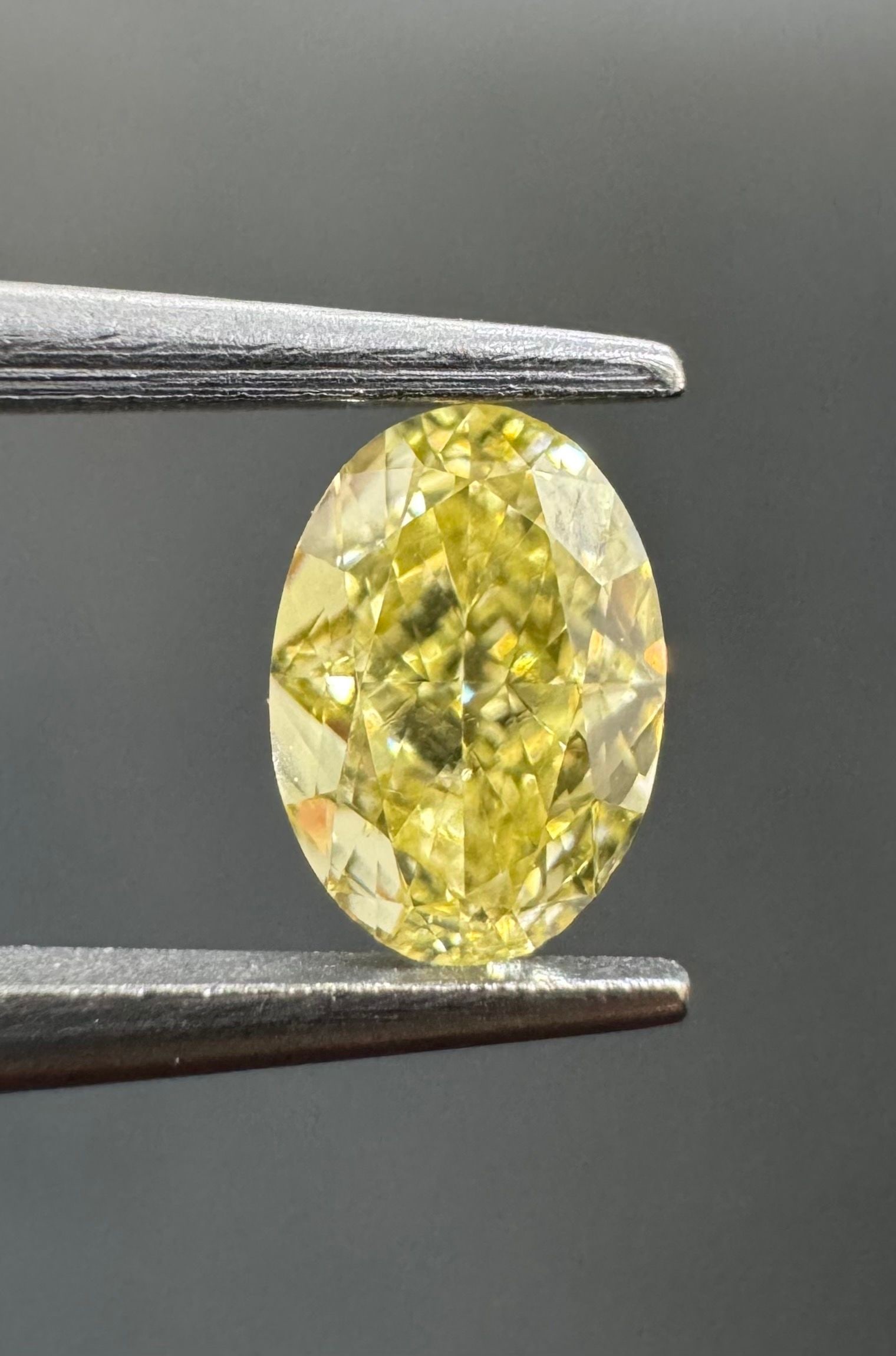 Loose Diamond - OVAL 0.51ct Fancy Intense Yellow VVS1: Loose Diamond - OVAL 0.51ct Fancy Intense Yellow VVS1 Source: Natural Shape: OVAL Carats: 0.51 Color: Fancy Intense Yellow Certification: GIA Video:
