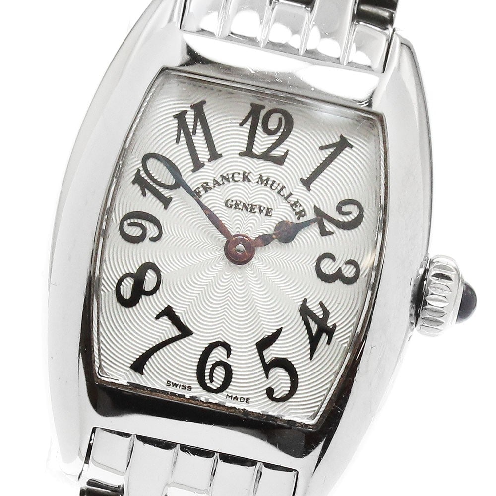 FRANCK MULLER Tonneau Curvex Petit 2502QZ Ladies Quartz Wristwatch: FRANCK MULLER Tonneau Curvex Petit 2502QZ Ladies Quartz Wristwatch Pre-owned Franck Muller Tonneau Curvex Petit women's wristwatch with a quartz movement and a silver dial. The stainless steel case an