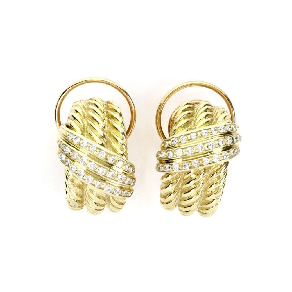 David Yurman diamond huggie earrings 14k yellow gold triple cable: David Yurman diamond huggie earrings 14k yellow gold triple cable This authentic pair of David Yurman huggie earrings is crafted from 14k yellow gold with a polished finish. The design features a trip