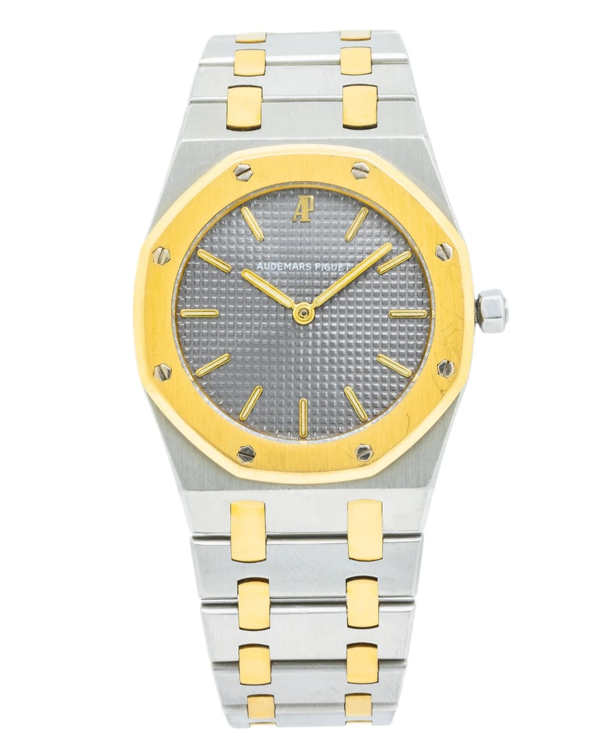 Ladies Audemars Piguet Royal Oak Watch Ref. 56303SA.OO.0789SA 2-Tone Bracelet: Ladies Audemars Piguet Royal Oak Watch Ref. 56303SA.OO.0789SA 2-Tone Bracelet A ladies Audemars Piguet Royal Oak watch with a grey dial and gold markers, presented on a 2-tone bracelet. The watch feat