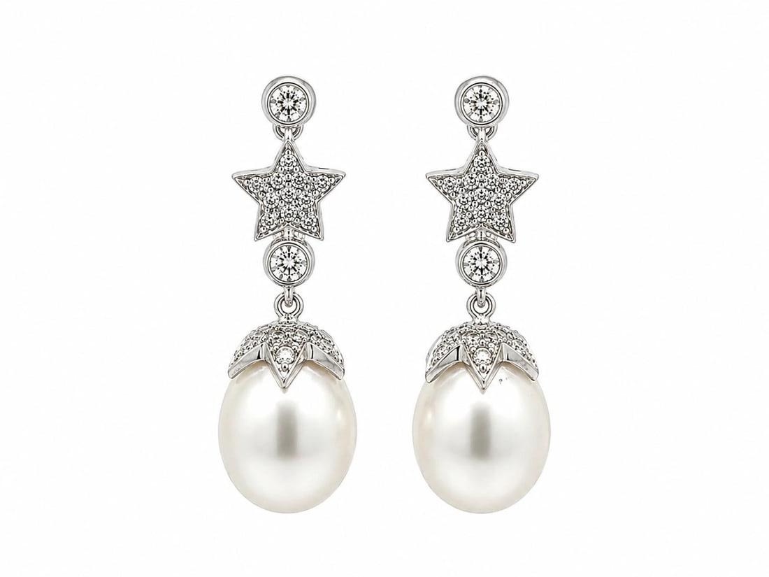 Unbranded 18k White Gold Pearl Diamond Star Drop Earrings: Unbranded 18k White Gold Pearl Diamond Star Drop Earrings Elegant dangle earrings crafted in solid 18k white gold, featuring two egg-shaped cultured pearls accented by natural diamonds in a star-inspi