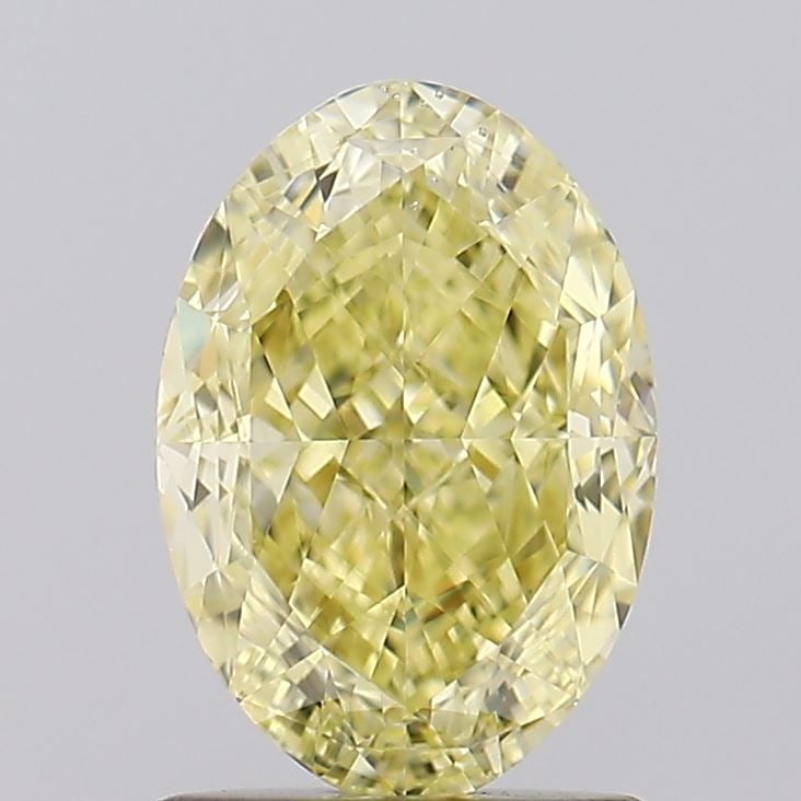 Loose Diamond - OVAL 1.74ct Fancy Yellow SI1: Loose Diamond - OVAL 1.74ct Fancy Yellow SI1 Source: Natural Shape: OVAL Carats: 1.74 Color: Fancy Yellow Certification: GIA Video: