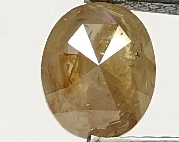 Loose Diamond - OVAL 1.02ct Salt and Pepper I3: Loose Diamond - OVAL 1.02ct Salt and Pepper I3 Source: Natural Shape: OVAL Carats: 1.02 Color: Salt and Pepper Certification: NONE The Diamond Depot Guarantee: All items in this auction are guaranteed