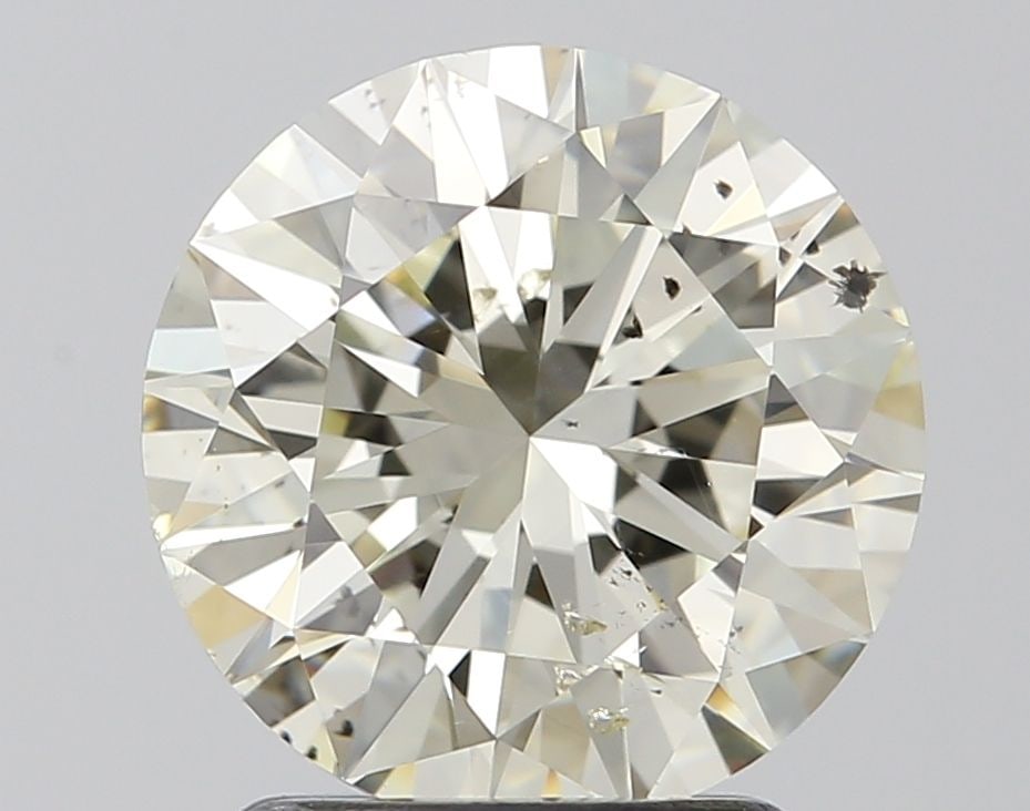 Loose Diamond - ROUND 2.01ct K SI2: Loose Diamond - ROUND 2.01ct K SI2 Source: Natural Shape: ROUND Carats: 2.01 Color: K Clarity: SI2 Certification: IGI Video: