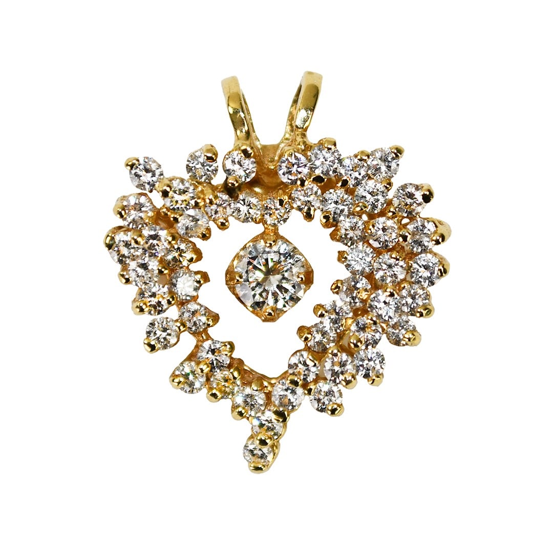 14K Yellow Gold Heart Diamond Cluster Pendant 1.40ct: 14K Yellow Gold Heart Diamond Cluster Pendant 1.40ct This heart-shaped cluster pendant is crafted from 14k yellow gold and features a total diamond weight between 1.25 and 1.49 carats. The center diam