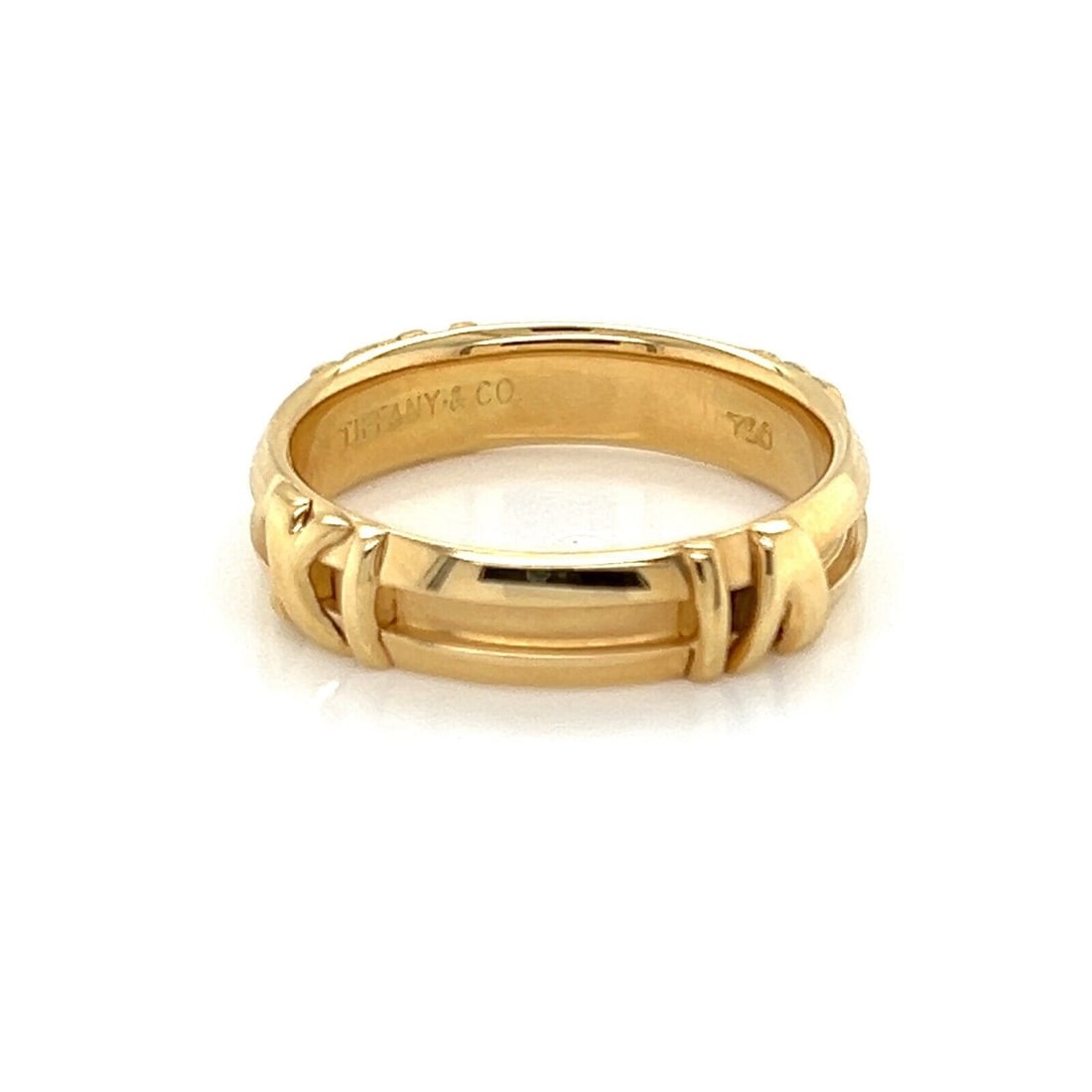Tiffany & Co. Atlas Band Ring 18k Yellow Gold Size 5.5: Tiffany & Co. Atlas Band Ring 18k Yellow Gold Size 5.5 Authentic Tiffany & Co. Atlas band ring crafted in 18k yellow gold, featuring the collection's iconic Roman numeral motif and a polished finish. 