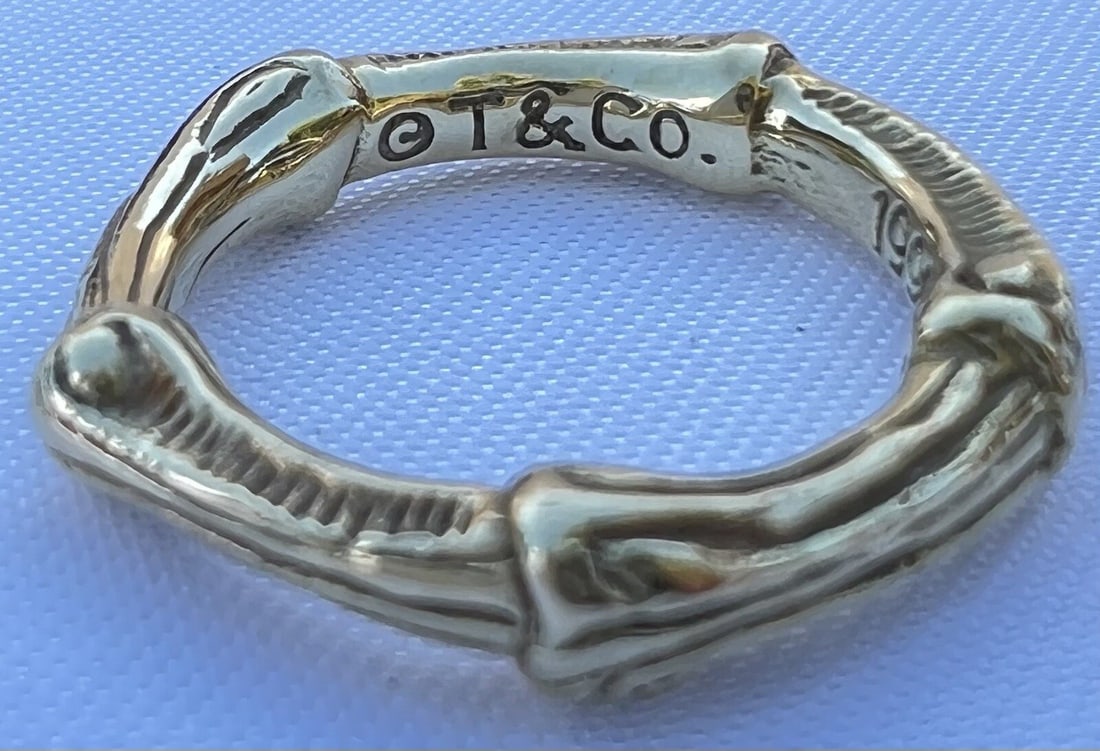 Tiffany & Co 18K Yellow Gold Ring Size 3.75 with Box: Tiffany & Co 18K Yellow Gold Ring Size 3.75 with Box This exquisite Tiffany & Co. ring is crafted in 18K yellow gold, showcasing exceptional detail and craftsmanship. With a ring size of 3.75, it weig