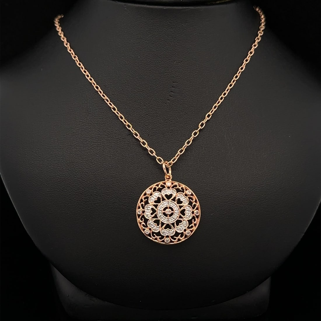 14k Rosy Yellow Gold Diamond Circle Pendant Necklace 0.10ctw: 14k Rosy Yellow Gold Diamond Circle Pendant Necklace 0.10ctw Adorn yourself with this exquisite 14k Rosy Yellow Gold Diamond Open Work Disk Circle Pendant Necklace. This stunning piece features a tota