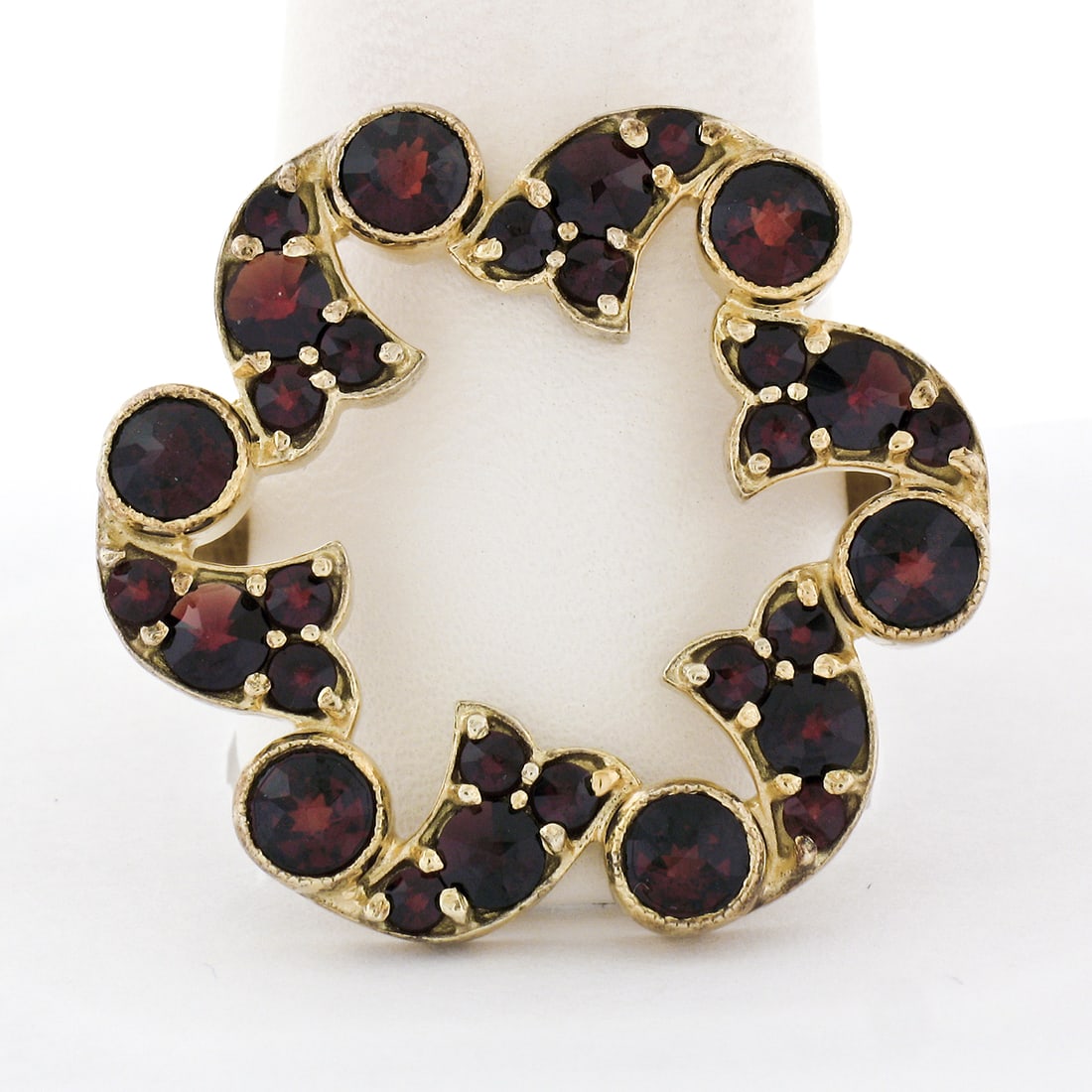 Adjustable Bohemian Garnet Wreath Cocktail Ring Gold Plated 900 Silver 3.54ctw: Adjustable Bohemian Garnet Wreath Cocktail Ring Gold Plated 900 Silver 3.54ctw Vintage cocktail ring featuring an open wreath design set with old round cut Bohemian garnets. Crafted in fine .900 silve