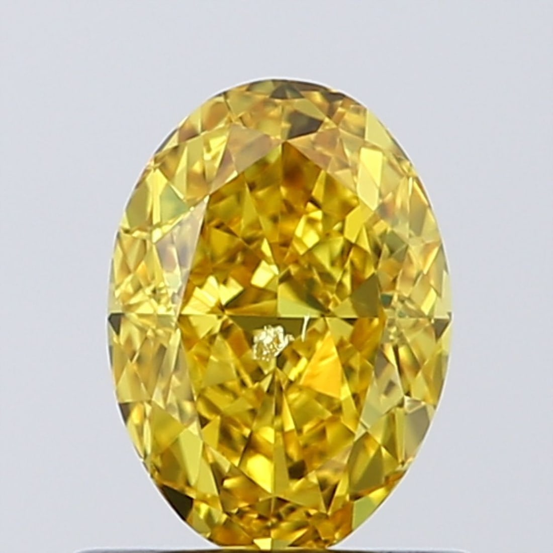 Loose Diamond - OVAL 0.71ct Fancy Vivid Yellow SI2: Loose Diamond - OVAL 0.71ct Fancy Vivid Yellow SI2 Source: Natural Shape: OVAL Carats: 0.71 Color: Fancy Vivid Yellow Certification: GIA Video: