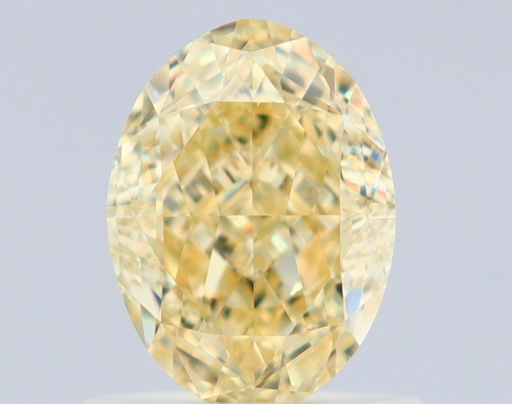 Loose Diamond - OVAL 1.0ct Fancy Yellow VS2: Loose Diamond - OVAL 1.0ct Fancy Yellow VS2 Source: Natural Shape: OVAL Carats: 1.0 Color: Fancy Yellow Certification: GIA Video: