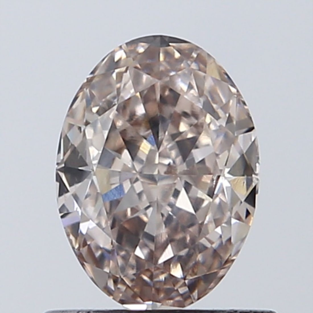 Loose Diamond - OVAL 0.73ct Fancy Light Pink SI1: Loose Diamond - OVAL 0.73ct Fancy Light Pink SI1 Source: Natural Shape: OVAL Carats: 0.73 Color: Fancy Light Pink Certification: GIA Video: