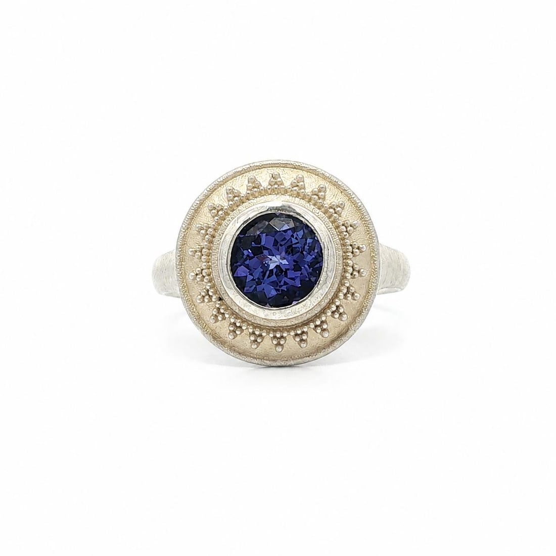 Sterling Silver Cocktail Ring with 1.20ct Bezel Set Tanzanite Size 6.5: Sterling Silver Cocktail Ring with 1.20ct Bezel Set Tanzanite Size 6.5 Sterling silver cocktail ring featuring a natural tanzanite in a bezel setting with a matte finish and beading work. The round pl