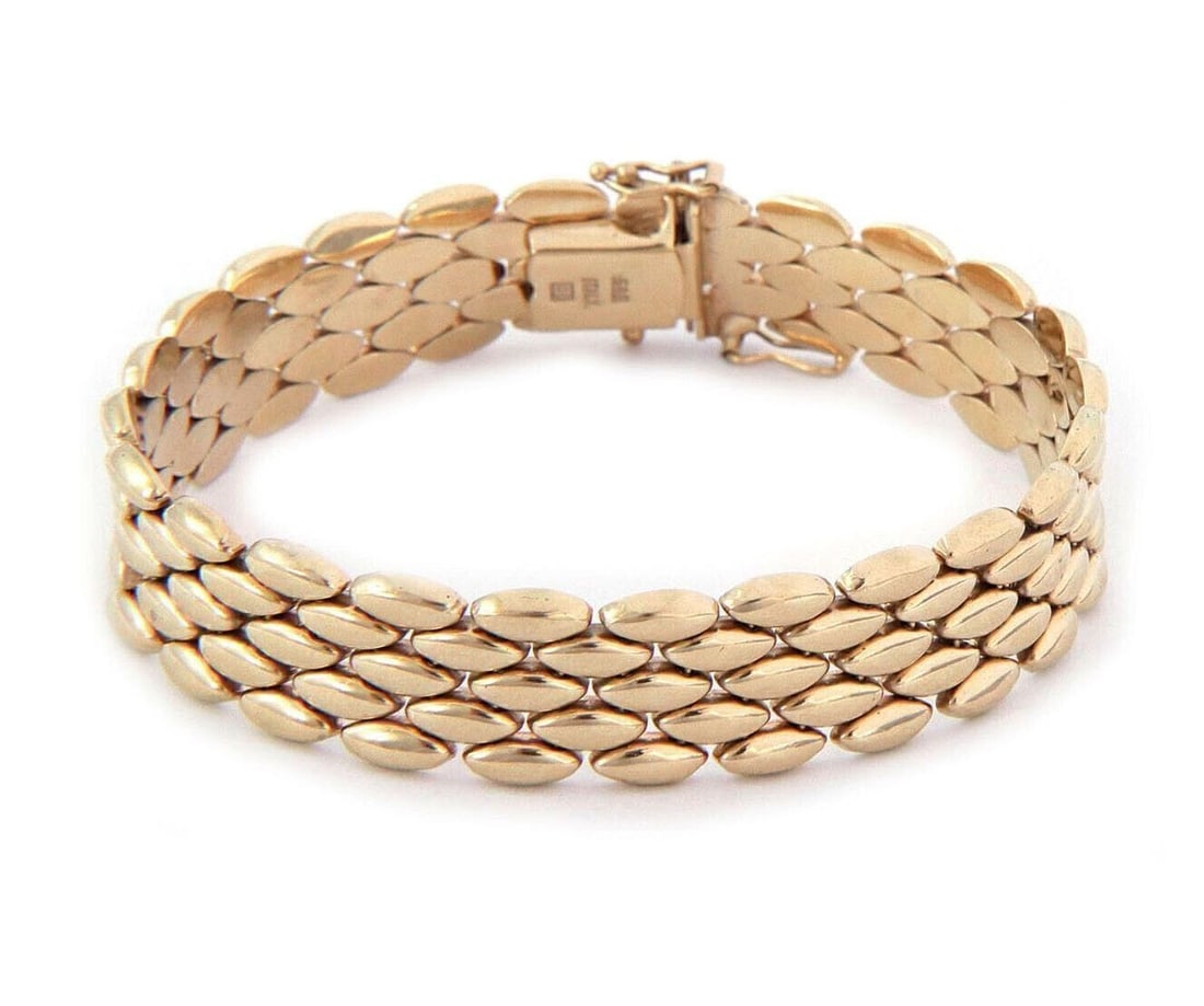 Unbranded 14k Yellow Gold Five Row Marquise Link Flex Bracelet 7.5": Unbranded 14k Yellow Gold Five Row Marquise Link Flex Bracelet 7.5" Vintage/estate five-row marquise link flex bracelet crafted in 14k yellow gold. This bracelet features marquise-shaped open links in