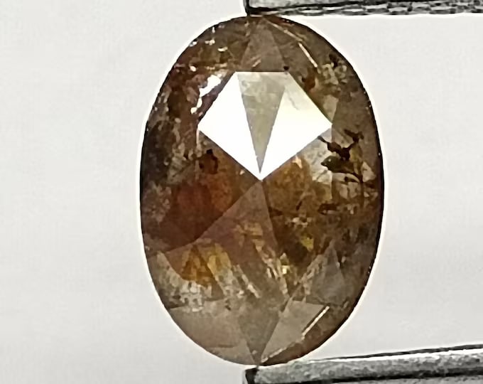 Loose Diamond - OVAL 0.58ct Salt and Pepper I3: Loose Diamond - OVAL 0.58ct Salt and Pepper I3 Source: Natural Shape: OVAL Carats: 0.58 Color: Salt and Pepper Certification: NONE The Diamond Depot Guarantee: All items in this auction are guaranteed