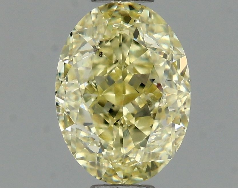 Loose Diamond - OVAL 0.71ct Y-Z SI1: Loose Diamond - OVAL 0.71ct Y-Z SI1 Source: Natural Shape: OVAL Carats: 0.71 Color: Y-Z Certification: GIA The Diamond Depot Guarantee: All items in this auction are guaranteed to be 100% authentic. A