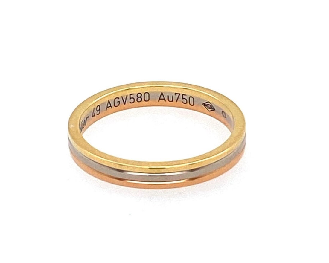 Cartier Trinity Tri Color 18k Gold Band Ring Size 49 with Certificate: Cartier Trinity Tri Color 18k Gold Band Ring Size 49 with Certificate Authentic Cartier Trinity band ring featuring the iconic rolling three-band design in 18k yellow, rose, and white gold. This signe